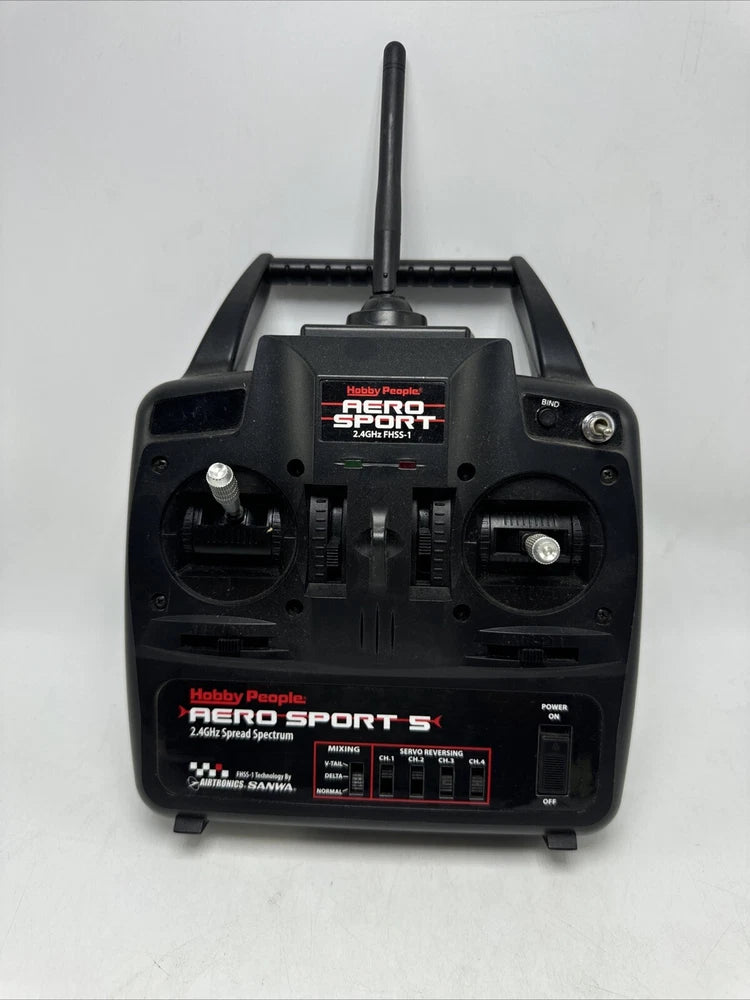 Black RC airplane transmitter with top antenna and sporty control panel