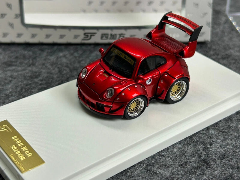 Red resin Porsche RWB 993 model car toy with raised rear wing and detailed wheels