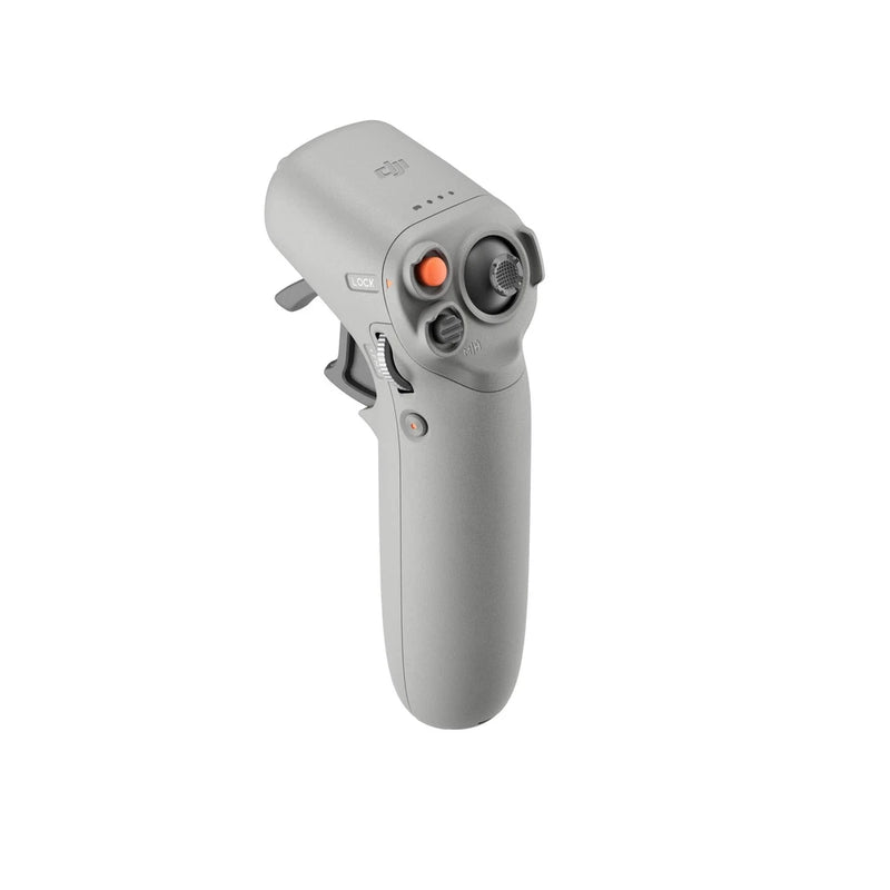 Gray handheld drone controller with orange button and dual thumb dials