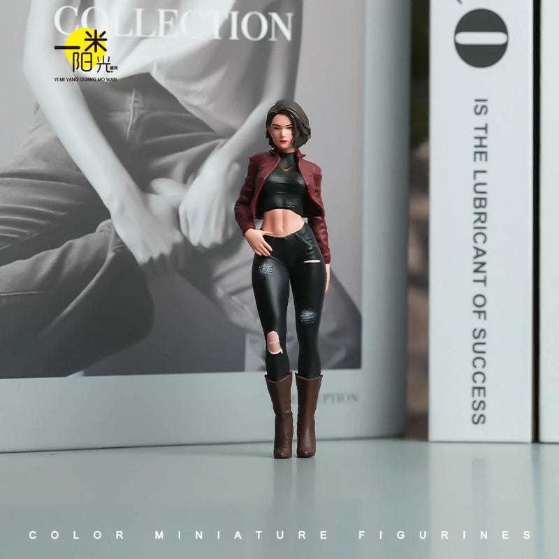 Resin miniature fashion figure girl in black leather pants, maroon jacket, brown boots