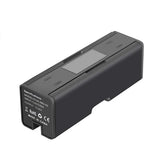Dark battery charging hub with display and charging port openings on casing