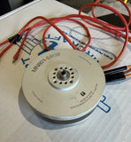 Used T-MOTOR fixed-wing UAV motor with circular housing and red/black connector wires