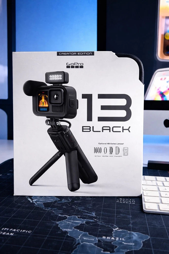 GoPro HERO13 Creator Edition action camera with black mount and mini tripod, shown on box