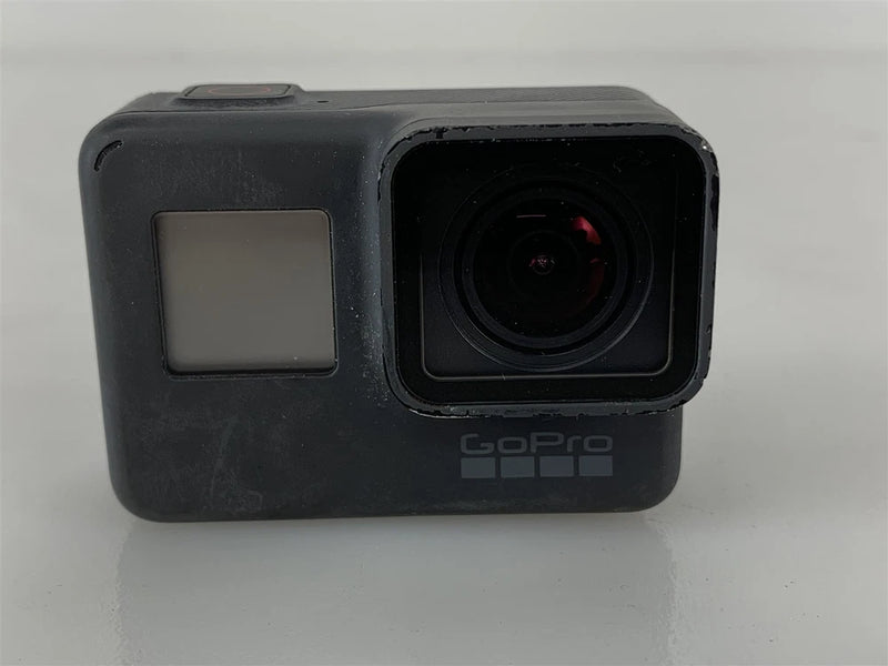 GoPro Hero5 action camera front view, black body, LCD screen and wide-angle lens