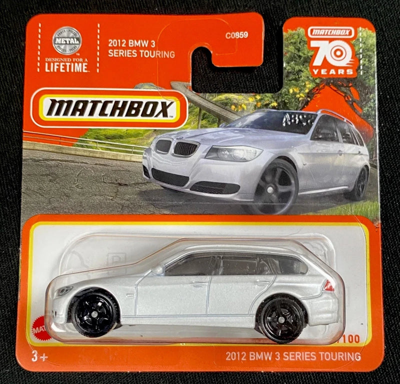 Matchbox 2012 BMW 3 Series Touring silver model car with black wheels, in blister pack
