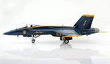 Blue and gray fighter jet model with landing gear and tail markings