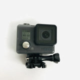 GoPro Hero action camera with waterproof housing, front lens, and black mounting base