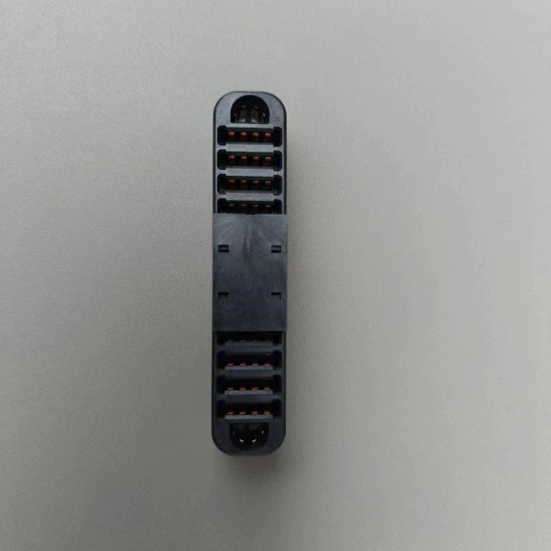 DJI Agras battery port socket with metal contact pins and openings