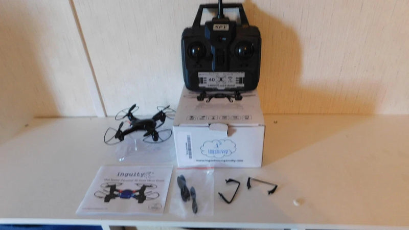Micro stunt drone with remote controller and instruction booklet, parts included