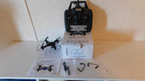 Micro stunt drone with remote controller and instruction booklet, parts included