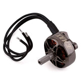 Grey brushless multirotor motor with black wires and front threaded shaft