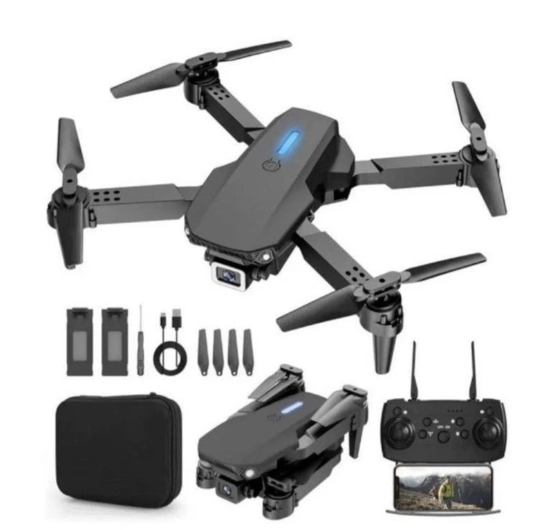 Foldable black quadcopter drone kit with remote controller, camera, and carrying case
