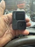 GoPro HERO9 Black action camera with front screen and camera lens housing