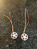 UpAir drone brushless motors with circular stator and colored power wires, pair