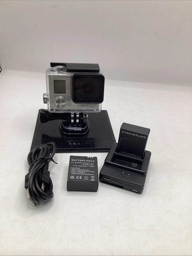 GoPro HERO3 action camcorder with clear waterproof case, battery pack and charging cradle