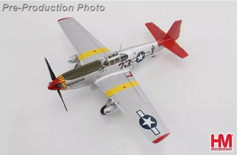 P-51C model airplane with gray fuselage, yellow stripes, red accents, black star insignia