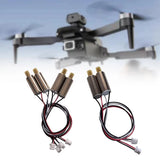 Quadcopter drone motor pair with attached wiring and connector plugs