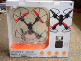 Video streaming quadcopter drone with camera, shown in retail box with propellers