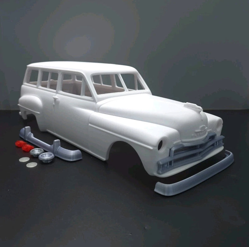 Light gray 3D printed RC car body shell with Plymouth Suburban station wagon shape