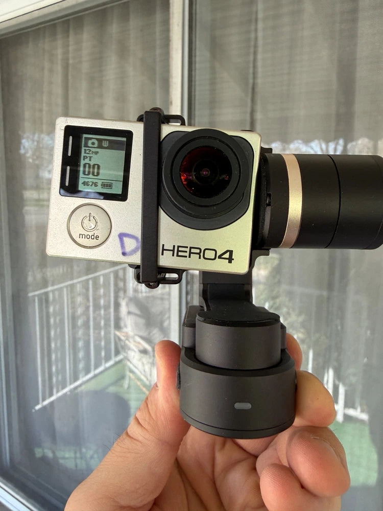 GoPro HERO4 action camera mounted on a 3-axis gimbal with display screen