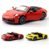 1/32 Porsche 911 Carrera diecast model car with open door, red, front three-quarter view