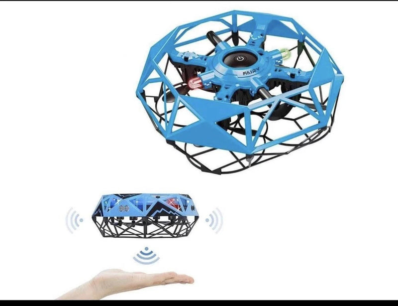 Blue and black mini UFO drone toy with propellers, hovering above a hand