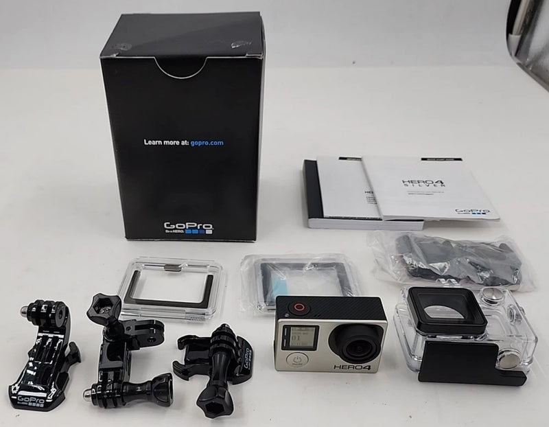 GoPro Hero 4 action camera kit with silver camera and mounting accessories
