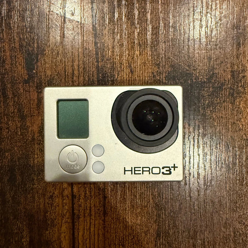 GoPro HERO3+ Silver Edition camcorder with front lens and side buttons, black lens housing