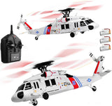 White and red RC helicopter with remote controller and spinning rotor blades