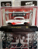 M2 Machines 1956 Chevrolet Bel Air model car kit, white with red flame decals in box