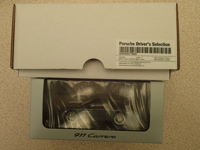 1:43 Porsche 911 Carrera coupe model in clear packaging, graphite blue