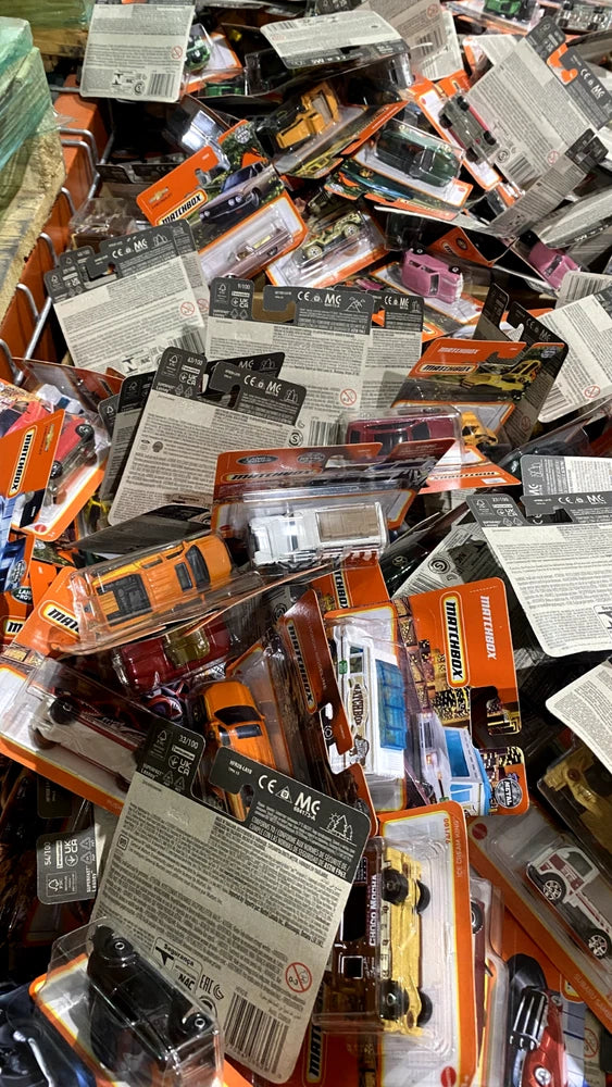 Assorted Matchbox die-cast car grab-bag packages with multiple blister packs