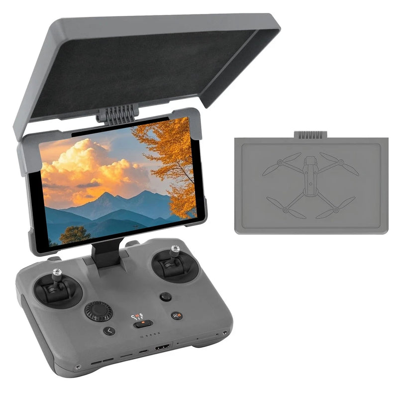 Drone accessory hood with screen mount and fold-out cover; includes gray spare panel
