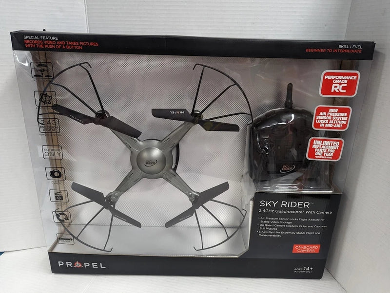 Silver gray 2.4GHz quadcopter drone with camera, four propellers, in retail box