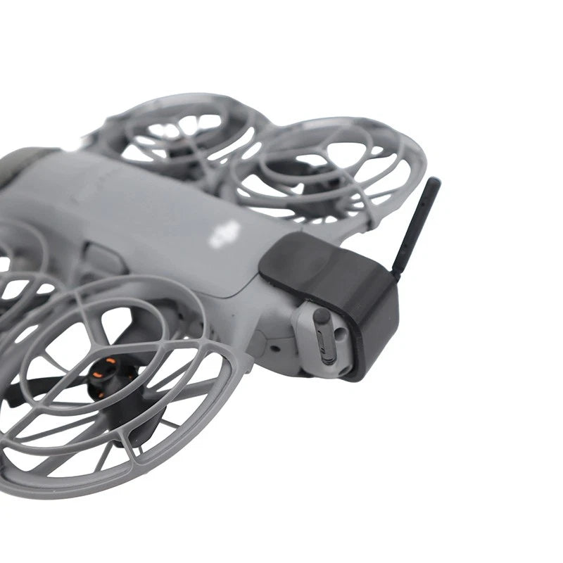 Gray antenna and lens cap guard accessory for DJI drone, with mount clip