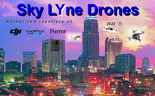 Parrot Bebop 2 drone flying above a city skyline