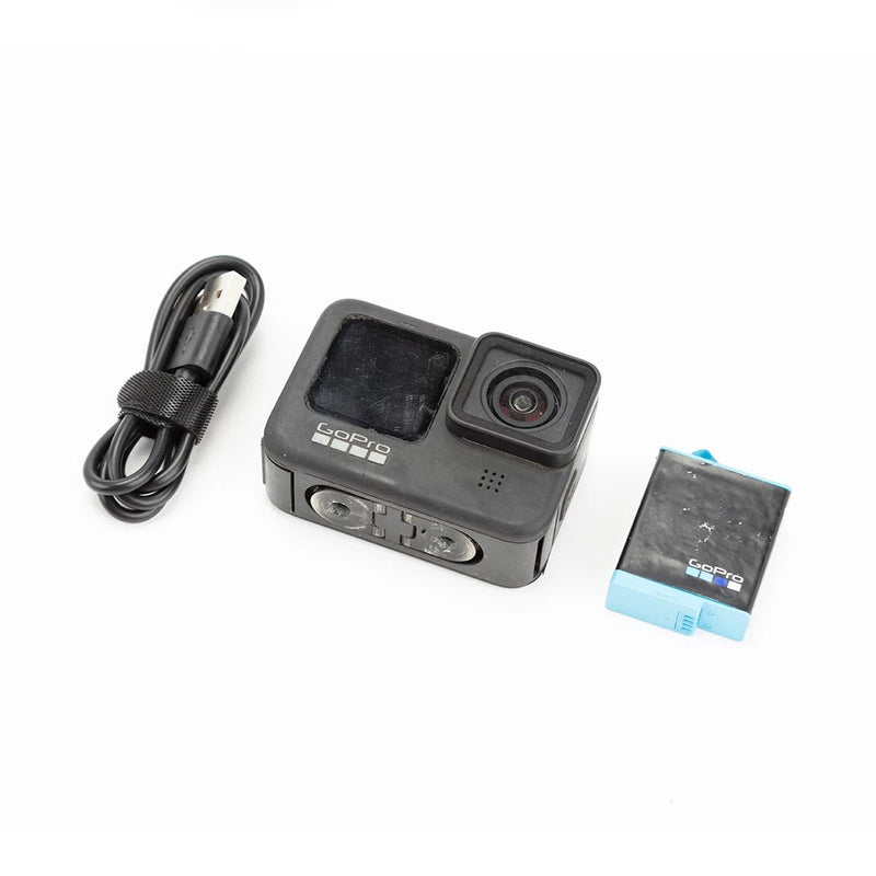 GoPro HERO9 Black action camera with charging cable and accessory box