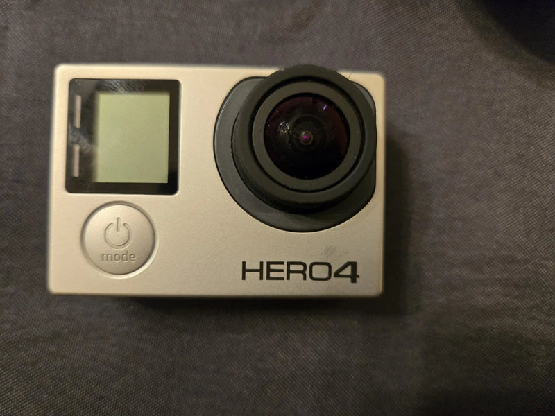 GoPro HERO4 action camera front with LCD screen and lens, mode button