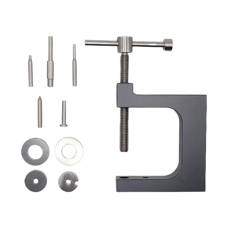 Compact metal pulling tool with C-frame and threaded screw, plus pin and washers