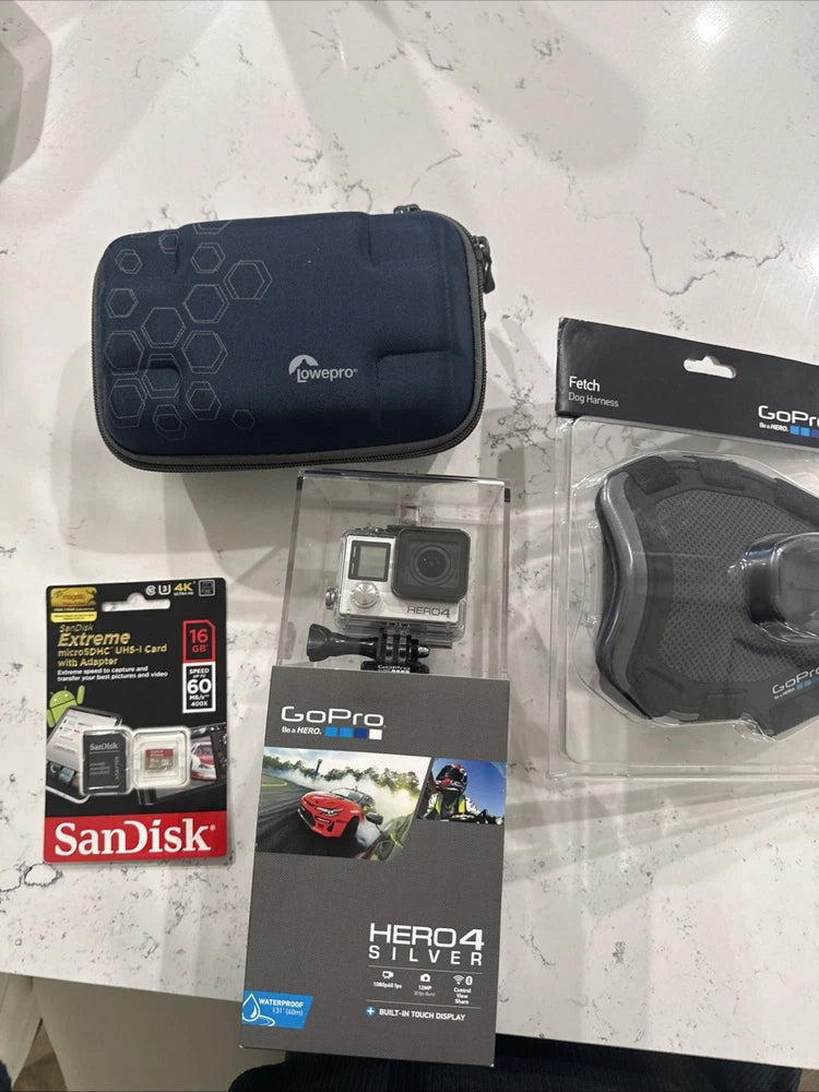 GoPro HERO4 Silver action camera kit: zip case, memory card, harness, and camera box