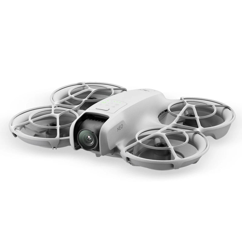 White quadcopter drone with prop guards and front camera module