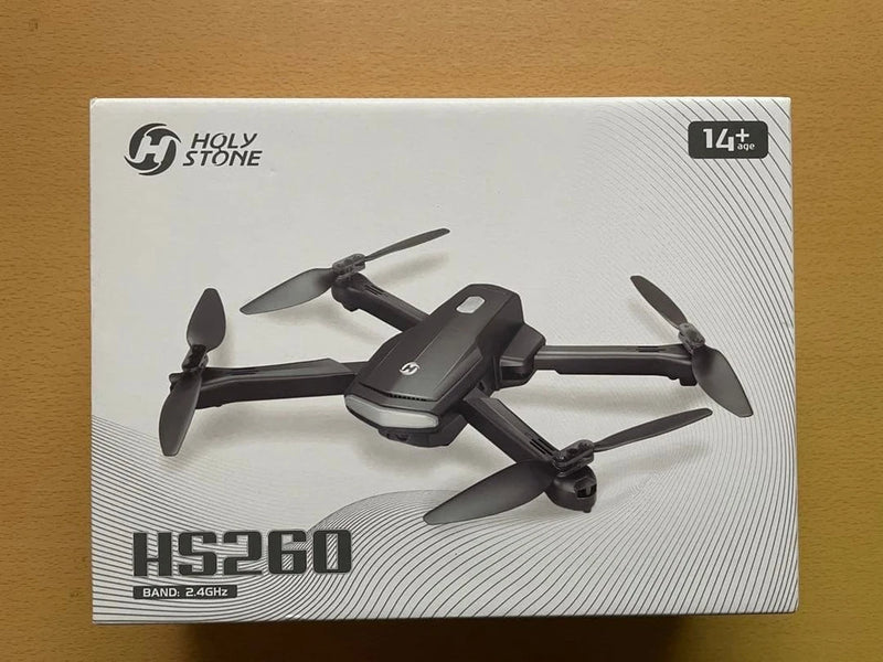 Holy Stone HS260 quadcopter drone box, dark gray drone with four propellers, 14+ 2.4GHz