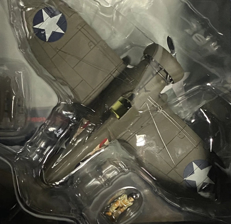 Gray WWII-style P-26 aircraft die-cast model with blue star markings, in blister pack
