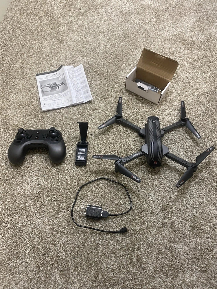 Quad-copter drone set with controller, four propellers, battery, and charging cable