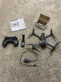 Quad-copter drone set with controller, four propellers, battery, and charging cable