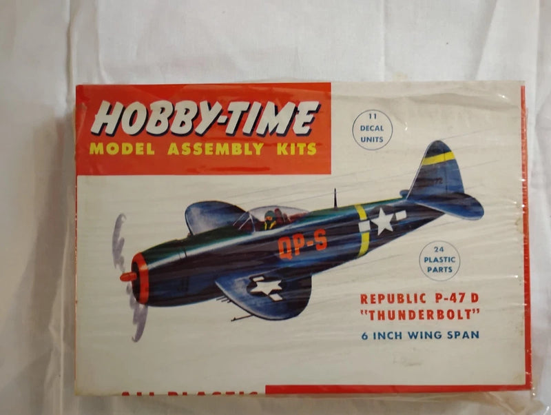 Plastic model assembly kit for a blue-and-green P-47D fighter aircraft, box art