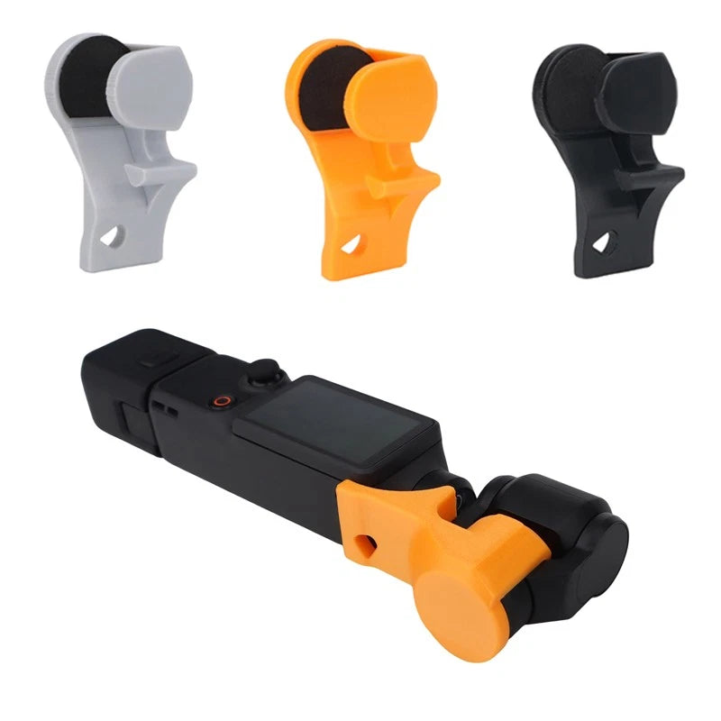 Plastic gimbal clip clamp for handheld camera, black with orange mounting grip