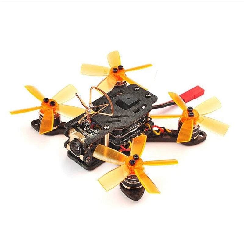 Micro FPV racing drone with four yellow propellers, black frame, orange motors