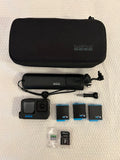 GoPro HERO10 Black action camera bundle with zip case, mounts, and memory cards