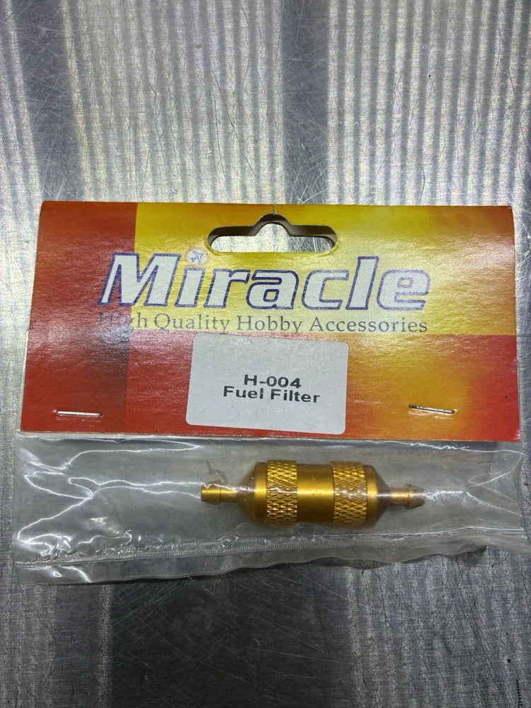 Miracle fuel filter with brass body and threaded inlet/outlet fittings